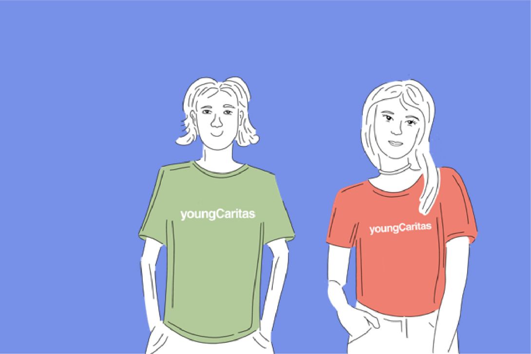 Zwei Personen in youngCaritas-T-Shirts posieren vor einem blauen Hintergrund, die Angebote der youngCaritas Oberösterreich repräsentierend.